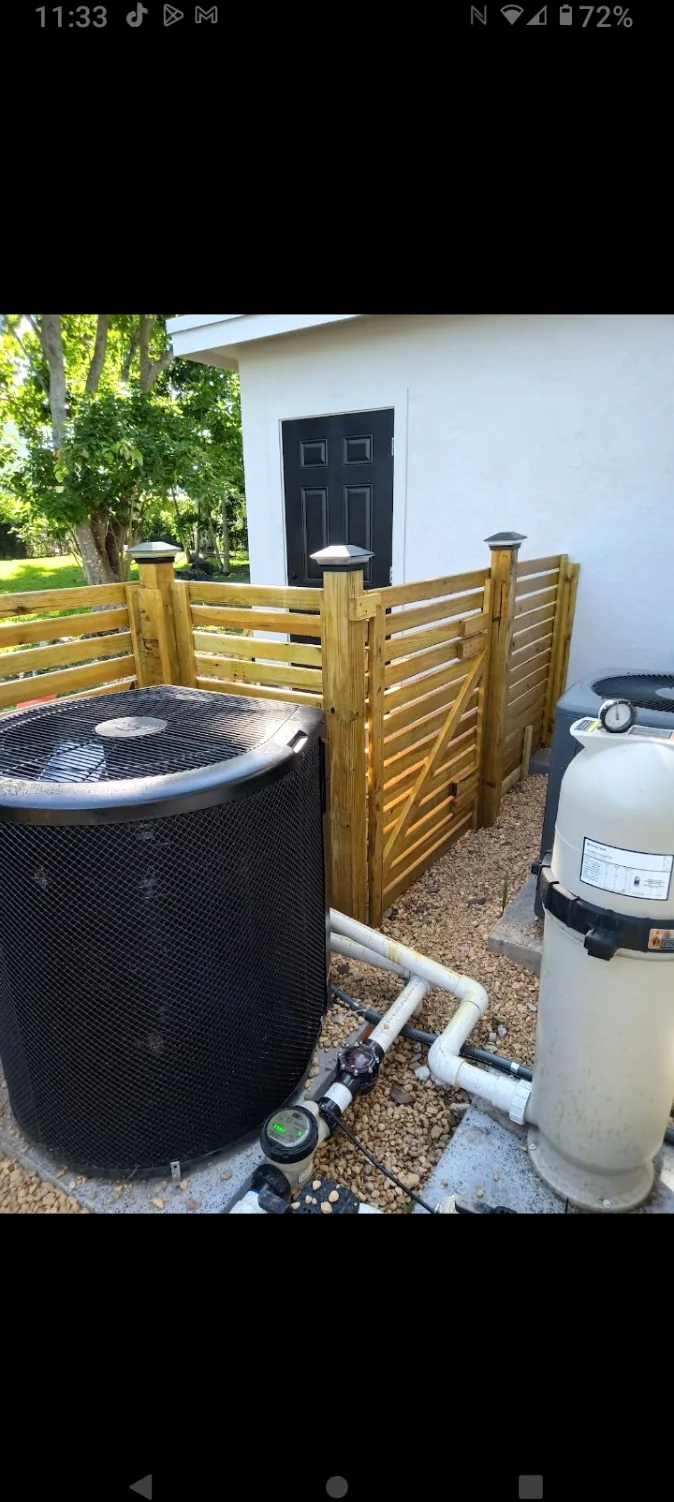 Wood enclosure around pool equipment