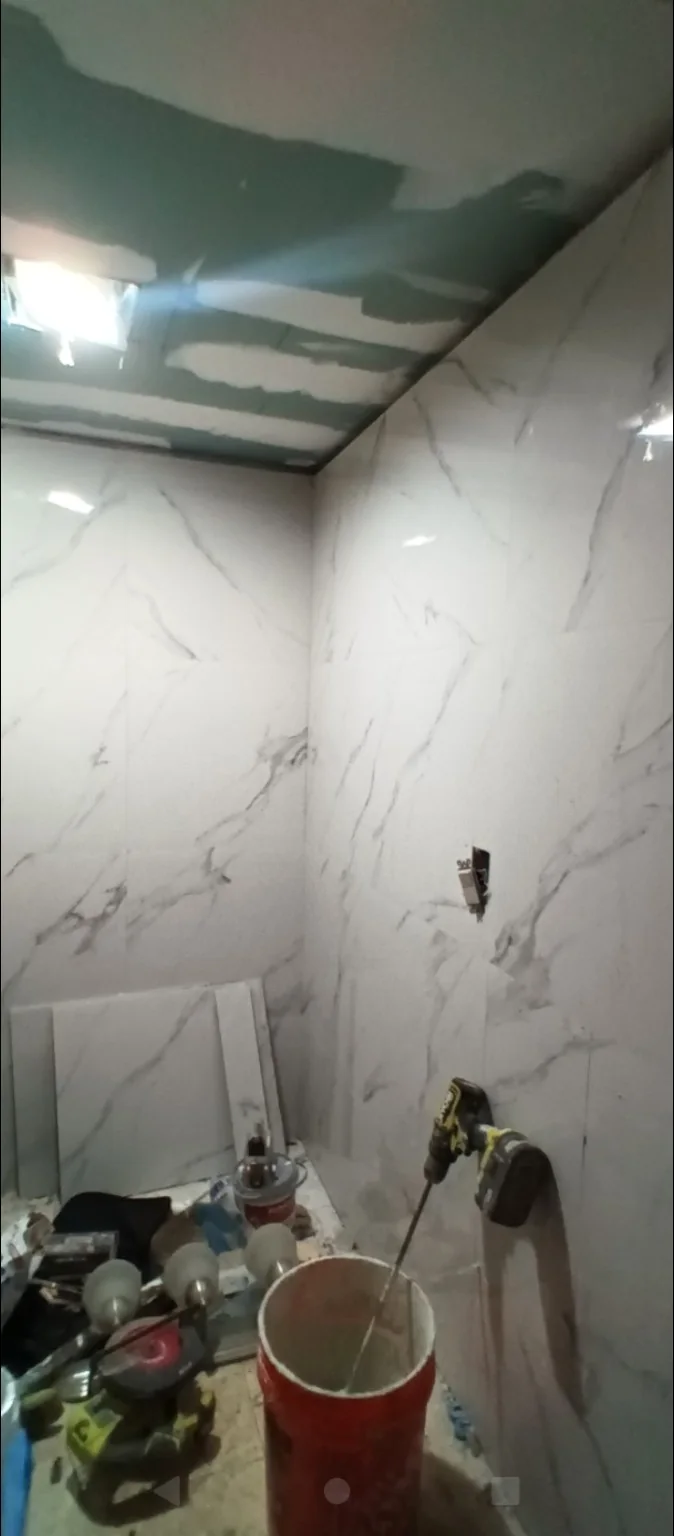 Bathroom wall installation in progress